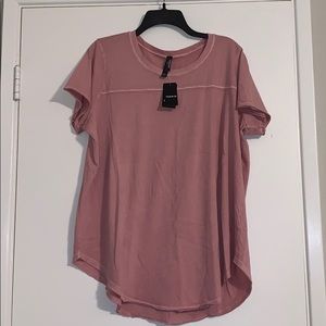 Torrid mauve football T-shirt.